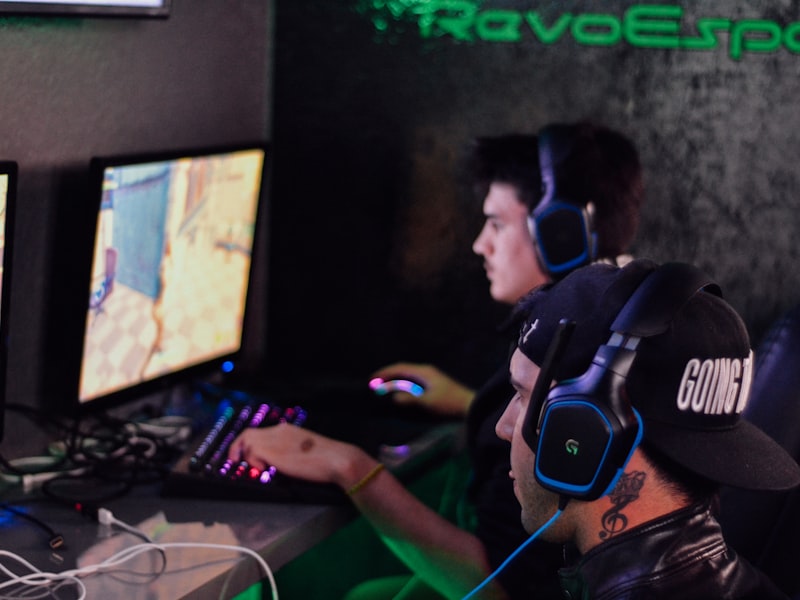 Row of high-end gaming PCs with RGB lighting